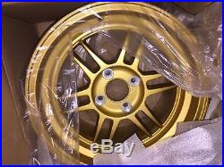 HRAI Gold & Gunmetal 15x9 + 39 4x100 Wheels